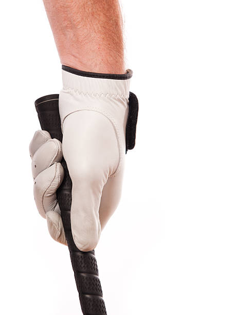 istock hand gripping golf club 183268509