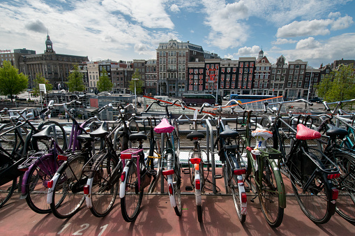 Hundreds of bicycles in a parking area in the center of Amsterdam, Netherlands.