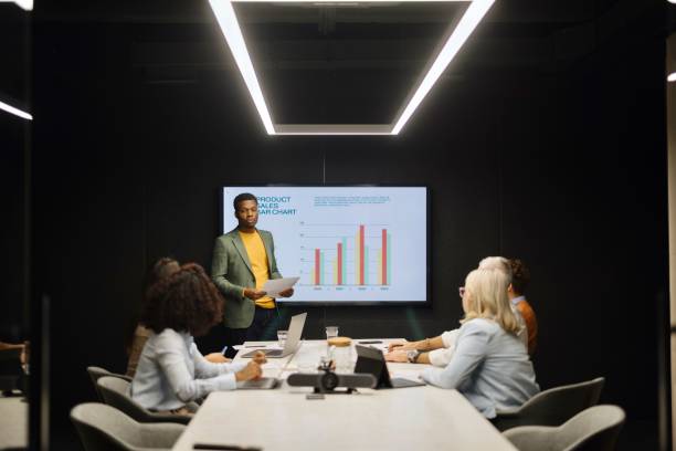 istock Man presenting something to his colleagues on a meeting 1832690399