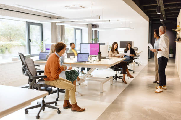 istock Colleagues talking about project in the modern company 1832697394