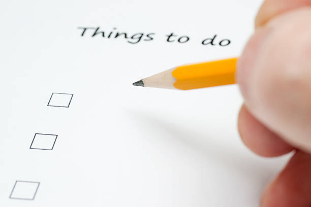 istock Hand Holding Pencil over Checklist Form for Things to Do 183270209
