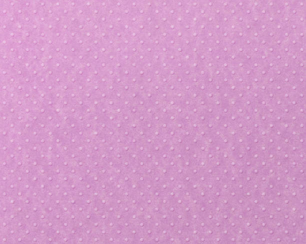istock pastel pink paper with raised dots 183270330