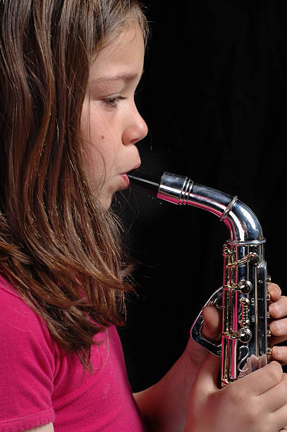 istock Girl and saxo 183270567