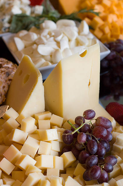 formaggio e uva - cheese tray cube swiss cheese foto e immagini stock