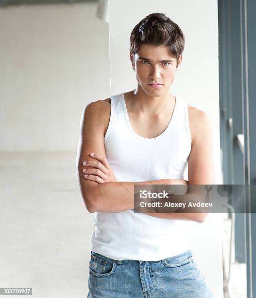 Teenage Boy Looking At Camera Stock Photo - Download Image Now - 16-17 Years, Beautiful People, Casual Clothing