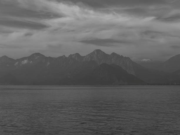 istock sea waves and beautiful mountains 1832709073