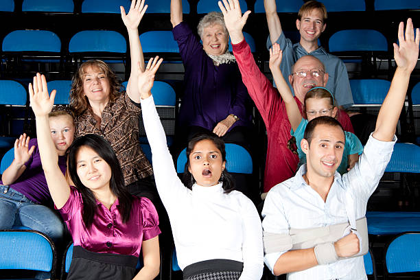 istock Diverse large group of people raising their hands 183271448
