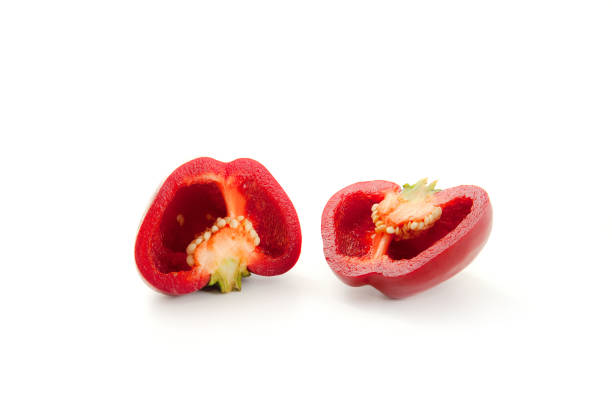 istock Halves of red bell pepper isolated on white background with clipping path. 1832714497