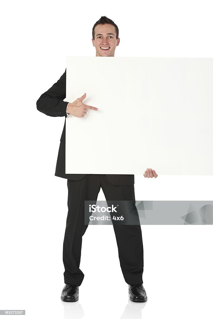 Empresário segurando uma placa - Foto de stock de 20 Anos royalty-free