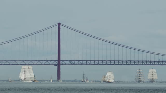 Sailing regatta in Lisbon near the bridge on April 25. September 3, 2023