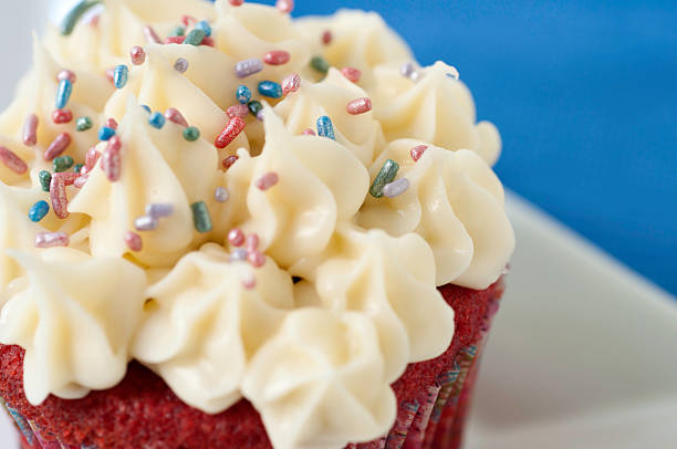istock One Red Velvet Cupcake with Cream Cheese Icing 183272863