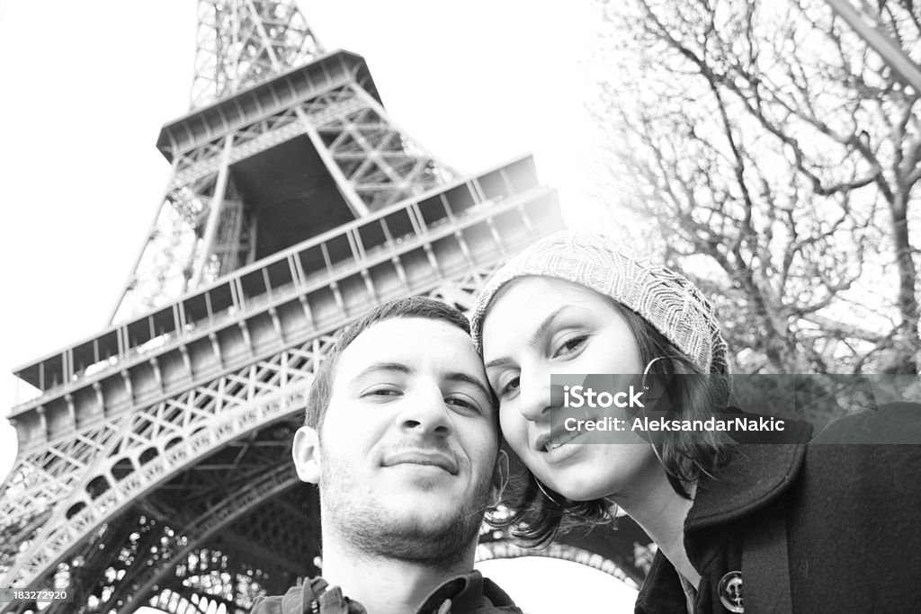 Greetings from Paris Self portrait of me & my fiance in front of Eiffel Tower. Photo was taken on a Valentine`s day 2010. Eiffel Tower - Paris Stock Photo