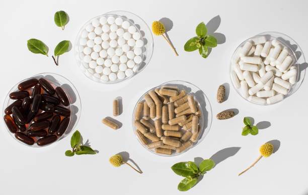 istock Various vitamins, tablets and dietary supplements with natural formulations on a white background. 1832729214
