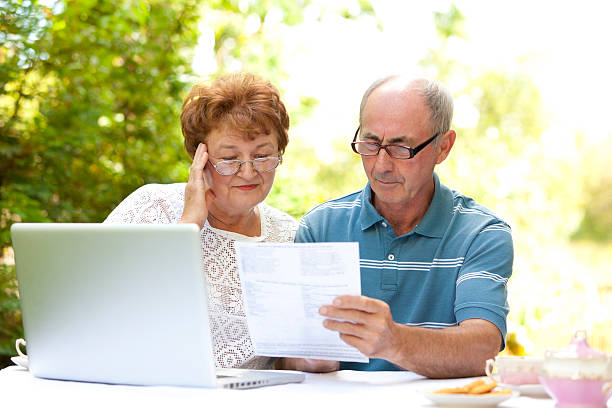 istock Sad senior couple goes over bills 183272960