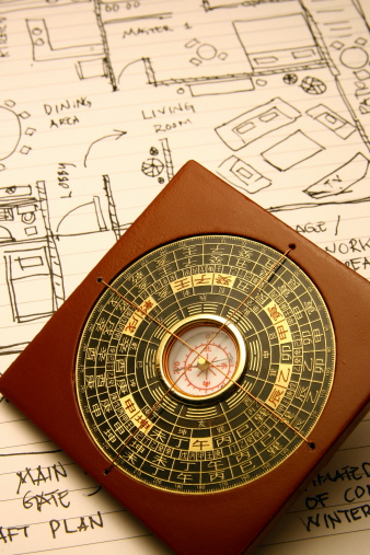 luopan compass with a fictitious drawing of draft floorplan - (floorplan - I created solely for this shot)