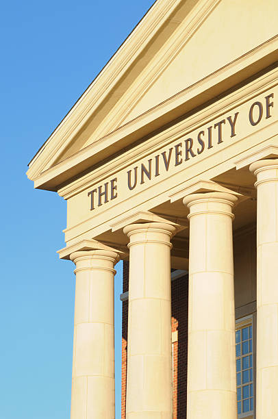 istock The university of sign on building 183273282
