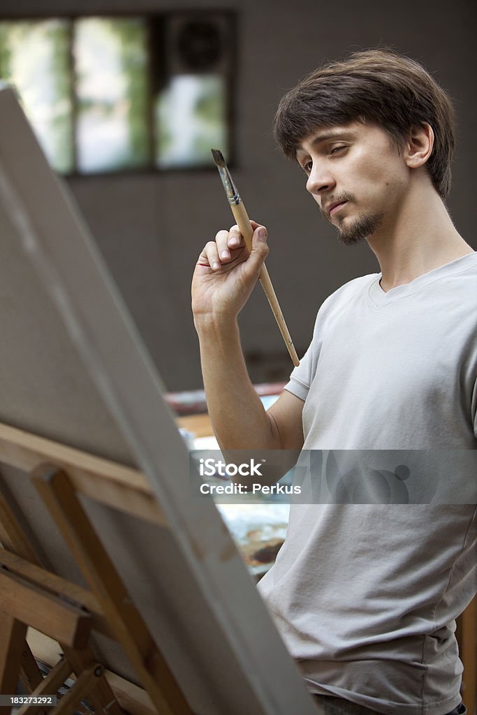 painting painter in work Acrylic Painting Stock Photo