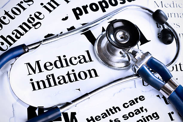 istock Stethoscope sits on newspaper headlines about medical inflation 183273504