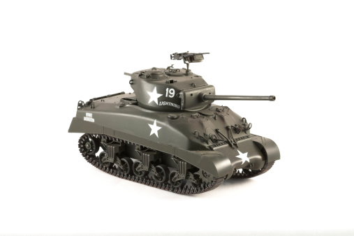 WW II Sherman tank model in olive drab color.  Model is photographed against a white background.