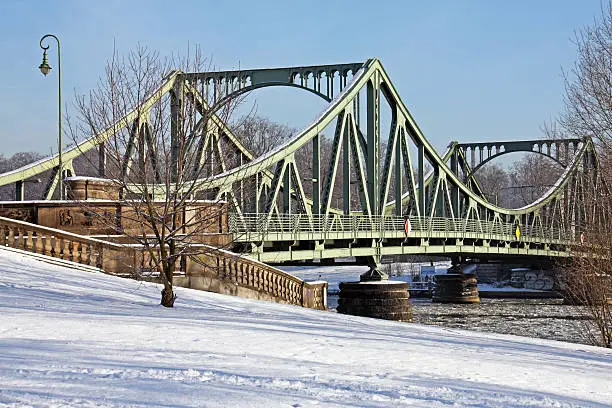 "Glienicke Bridge between Potsdam and Berlin in winter. Until 1989, during the time of Cold War, this bridge was the border between East and West."