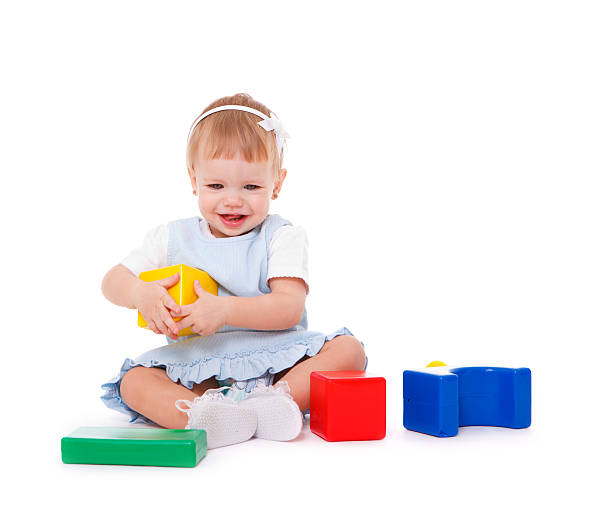 istock Baby girl playing with toys 183274384