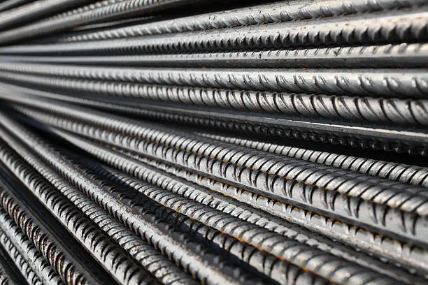Stack of steel rebars for reinforcing concrete on a construction site. More pictures are in this lightbox: