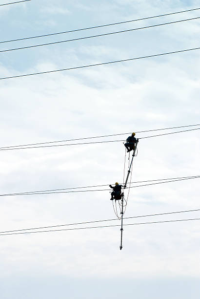 istock Electrician in mid-air 183274592