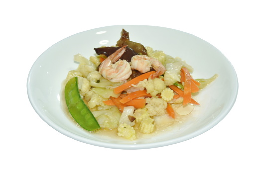stir fried mixed vegetable with shrimp in soy sauce on plate