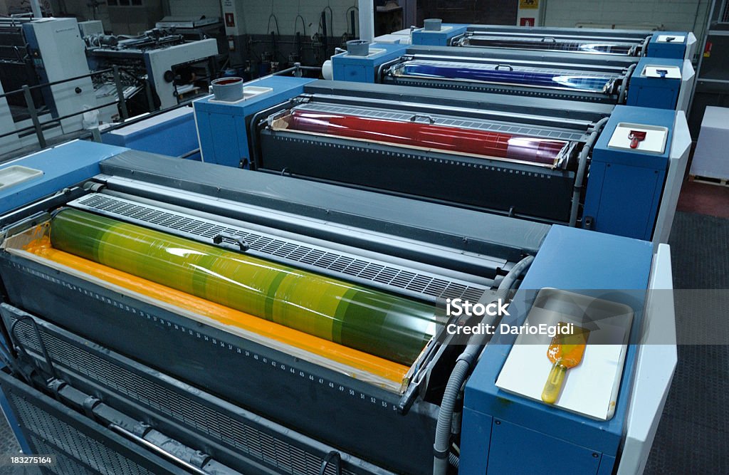 Colore quattro macchine da stampa offset di sopra - Foto stock royalty-free di Stampa offset