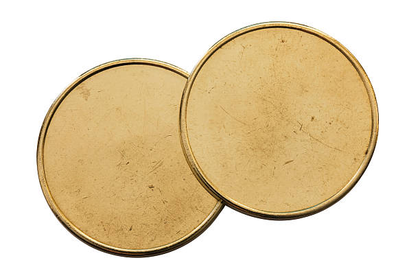 istock Top view of Two generic used blank coins on white 183275913