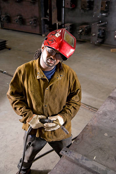 istock African American worker with welding equipment 183276200