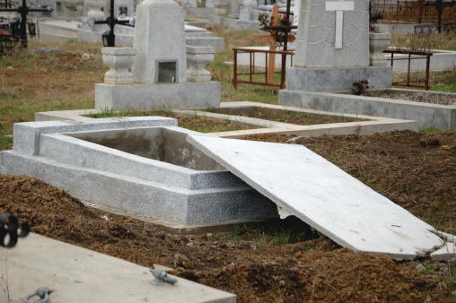 Tomb with lid laid aside