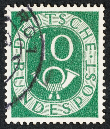 German postage stamp isolated on black