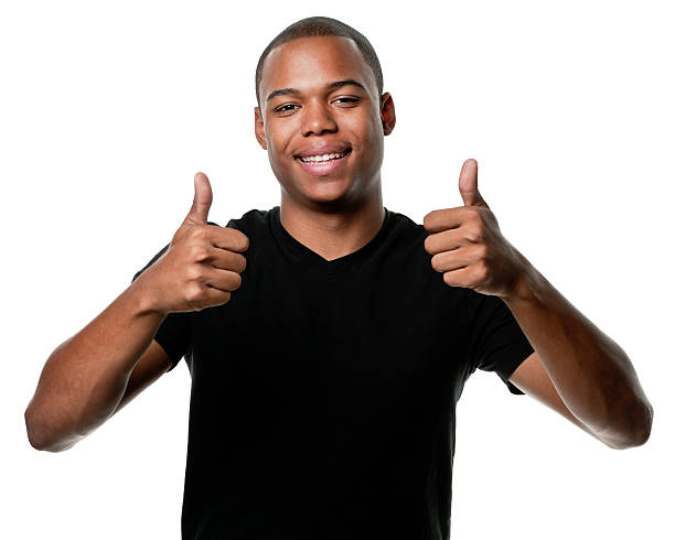 Happy Young Man Gives Thumbs-Up