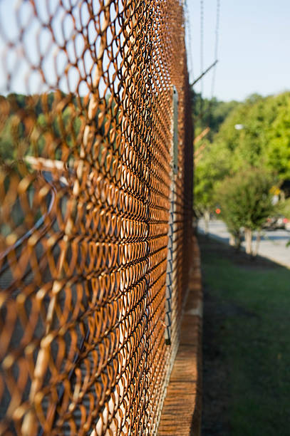 istock rusted old fence at a subway station 183280141