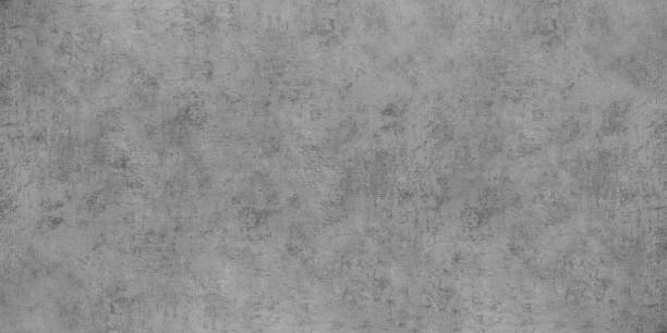 Old gray concrete wall large widescreen texture. Rough cement slab. Abstract grunge banner panoramic textured background