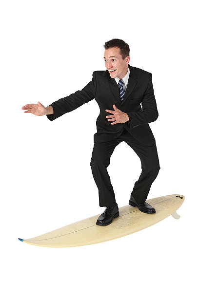 istock Businessman surfing on a surfboard 183280925
