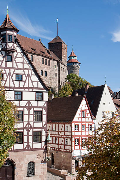 nuremberg view sight of nuremberg half-timbered houses with Kaiserburg-castle and Sinwellturm in background kaiserburg castle stock pictures, royalty-free photos & images