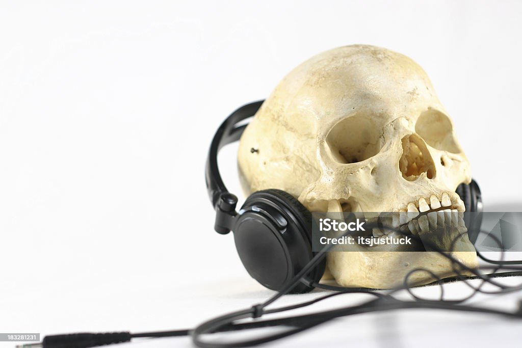 Hell Has Better Parties. A human skull wearing headphones.I'd love to see my work in action. :) Death Stock Photo