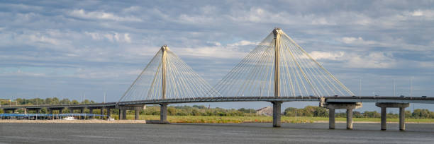 istock panorama of the Clark Bridge, a cable-stayed bridge across the Mississippi River between West Alton, Missouri and Alton, Illinois. 1832818367