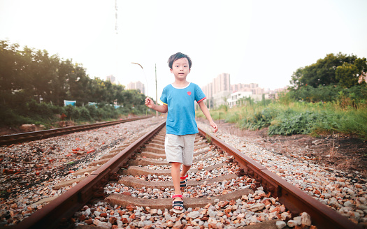 Child waiting for a train