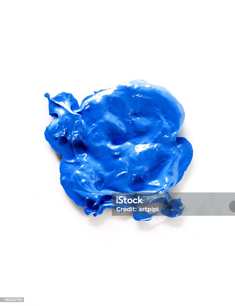 blue paint Splattered paint on white canvas Tempera Painting Stock Photo