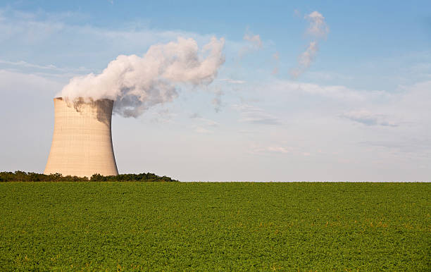 istock cooling tower and soybean field horz 183283058