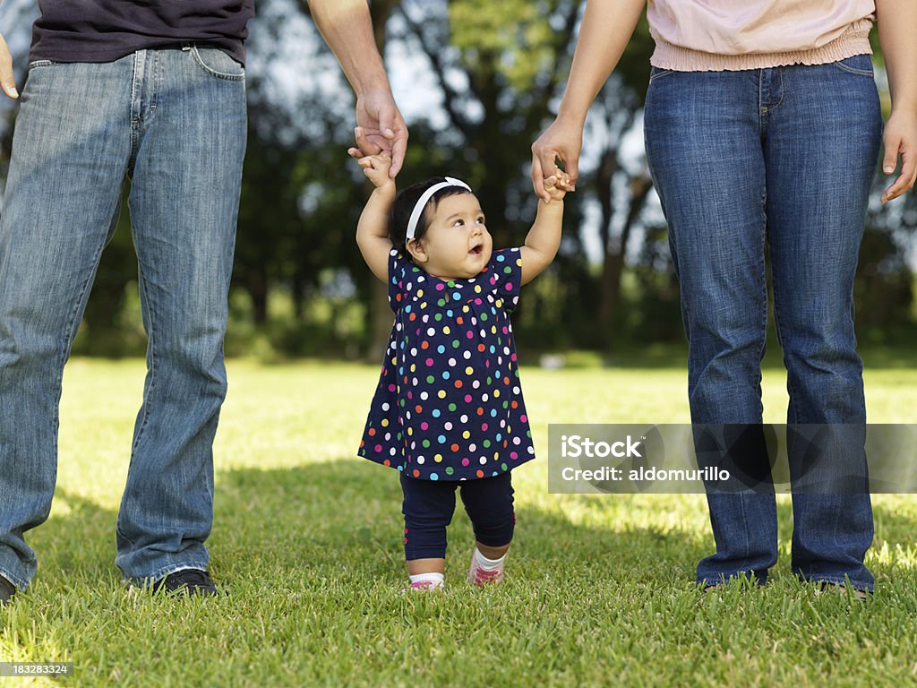 Baby Girl Walking With Her Parents Stock Photo - Download Image Now - Baby - Human Age, Mother, Father - iStock Baby Girl Walking With Her Parents Stock Photo - Download Image Now - Baby - Human Age, Mother, Father - iStock
