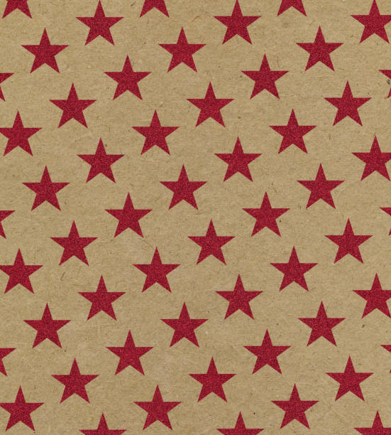 istock red glitter stars on brown paper 183283447