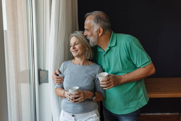 istock Serenade of Love: Mid-Adult Couple's Laughter 1832835238