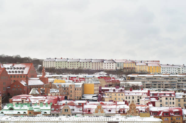 istock Winter city snow on roof 183283682