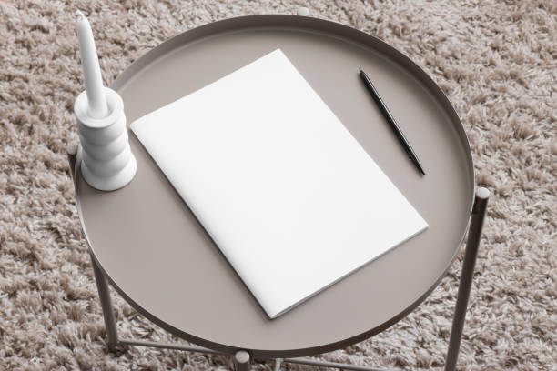 istock Magazine mockup with a candle on the beige table. 1832837018