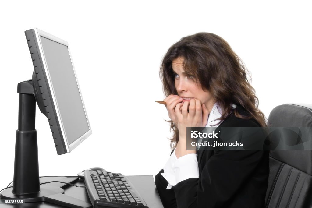 Slipped Deadline Stress "Photo of a young businesswoman staring at her computer with a fearful look, as if she just missed an important meeting or deadline." 20-29 Years Stock Photo