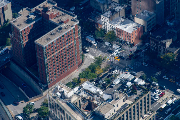 New York City, NY, USA-October 10, 2023; Aerial view over 9th Avenue and W 36th street in the Garment District, Midtown Manhattan with sun bright on intersection